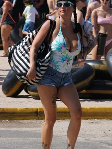 Girls in bikinis getting ready for tubing