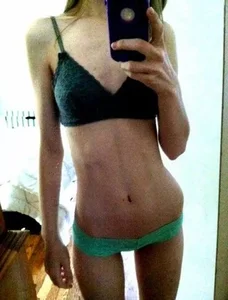 Very skinny girl's with a very long torso mirror selfies in underwear