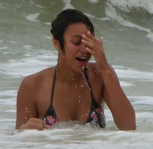 Sexy light skin black girl in a bikini with incredible body