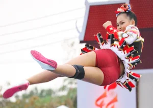 Bunch of athletic Thai cheerleaders at a competition