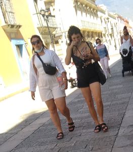 Some girls with a nice leg and peach