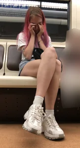 Girl With Pink Hair and Hot Legs in Denim Shorts in the Subway Train Candid Photo Gallery