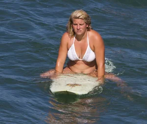 Candid surfer babes on the beach and in bikinis