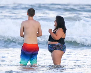 Extra thick girl at the beach in a bikini