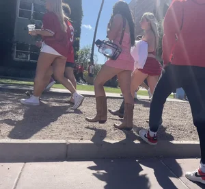 Hot college girls at football game (cheeks everywhere)