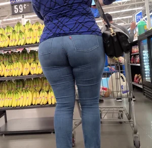 Hot candid cougar with a fat ass sucking in her jeans like a black hole