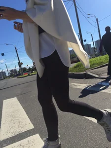 Blonde Girl With Fit Muscular Legs in Tight Black Jeans and Sneakers on a Crosswalk  - Street Creepshots Collection