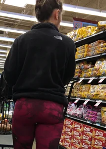 Milf grocery shopping in red leggings with a great ass