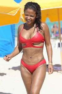 Christina Milian in red bikini in Miami with hard nipples
