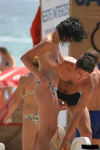 Beach voyeur girls in bikinis, thongs and topless
