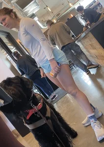 Cute little blue shorts sipping on a latte (VPL and a pokie!)