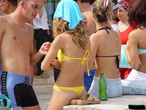 Beach voyeur girls in bikinis, thongs and topless