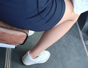 Girls' legs and feet closeup creepshots in public places