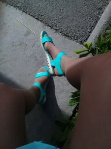 Legs in Pantyhose and Sandals Selfie