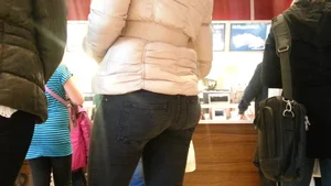 Two sexy girls at the mall in leggings and tight jeans with vpl