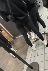 Tight ass sports team in line at airport