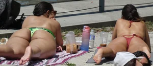 Two hot brunettes sunbathing (OC)