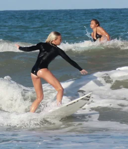 Hot surfer chicks out in the water