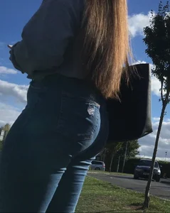 Long haired beauty teen with a tight ass in jeans