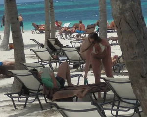 Bikini babe at the beach with nice tits and ass
