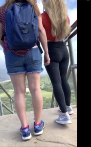 Teen in leggings walking down stairs with slight camel toe and busted