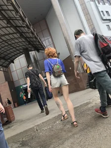 A Gorgeous Tall Ginger Girl in Shorts And Sandals With Tattooed Legs Street Creepshots