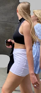 Stunning blonde in sports skirt