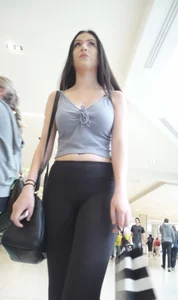 Cute Girl in Yoga Pants and a Top