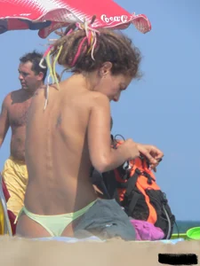 Sexy girls going topless at the beach showing off their sexy bodies