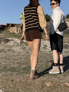 Hot Asian chick wearing mini shorts with her butt cheeks visible