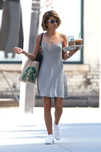 Sarah Hyland showing pokies while braless in a dress