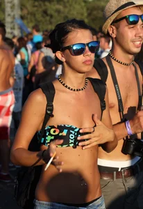 Boobs out in public in either bikini tops or bras