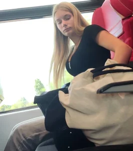 Hot busty blonde on train