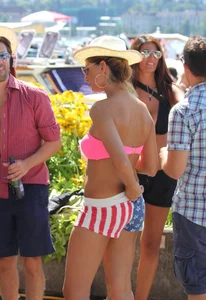 Boobs out in public in either bikini tops or bras