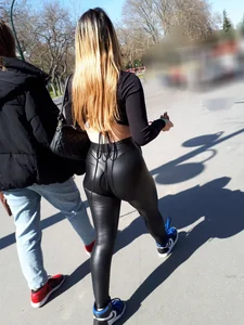 Girl in shiny leggings thong line