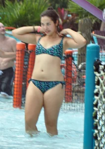 Thick brunette in a bikini while in the pool
