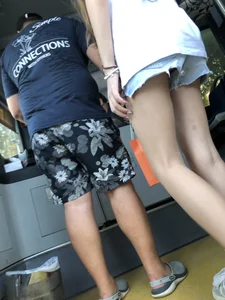 Candid girl's long skinny legs with pale skin getting on the bus creepshot