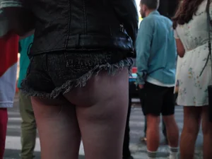 Girl in NYC showing her ass cheeks in denim shorts