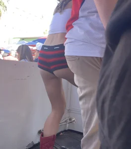 Hot college girls at football game (cheeks everywhere)