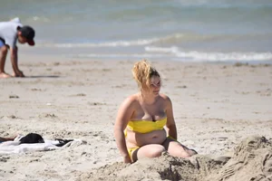 Extra thick beach girls in bikinis with big boobs