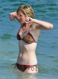 Cheetah print bikini blonde at the beach with nice body