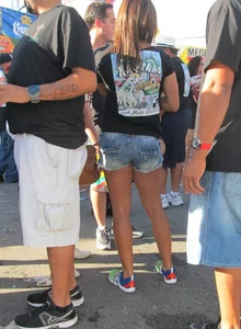 Brunette babe standing around in denim shorts