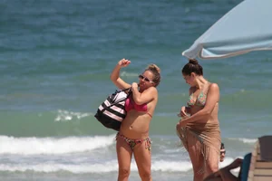 Big collection of various sexy girls on a beach in bikinis