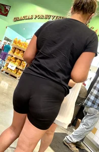 Sexy candid white chick with a nice ass and vpl in spandex shorts