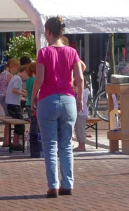 Big booty in blue jeans on the city street creepshot