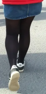 Girl out in denim skirt and tight stockings with nice legs