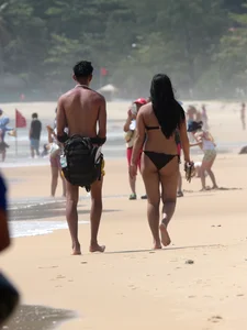 Sexy Asian on the beach with nice boobs and ass