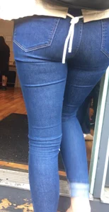 2 nice asses in tight jeans standing around