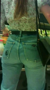 Sexy girl grocery shopping in jean with a nice ass