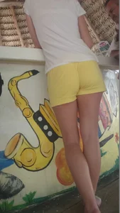 Milf in yellow shorts with vpl and a wedgie